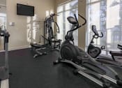 Thumbnail 27 of 30 - fitness center with television