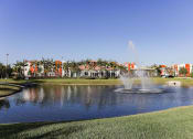 Thumbnail 4 of 30 - East Village Apartments' lake with fountain