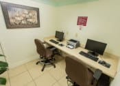 Thumbnail 14 of 24 - business center with computers and printer