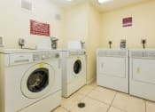 Thumbnail 18 of 24 - on-site laundry facility with washers & dryers