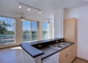 Thumbnail 15 of 18 - open concept kitchen with track lighting