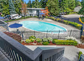 Thumbnail 6 of 29 - Aerial Pool View at Capri Apartments, Mountlake Terrace