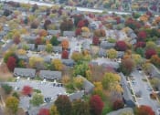 Thumbnail 26 of 26 - an aerial view of a neighborhood with colorful trees