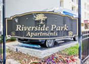 Thumbnail 17 of 17 - Monument sign outside of Riverside Park Apartments with name of community on sign