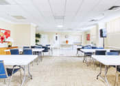 Thumbnail 5 of 17 - folding tables sand chairs in large room