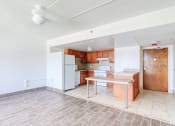 Thumbnail 15 of 24 - kitchen with efficient appliances, hardwood-style flooring, and island