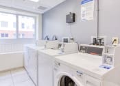 Thumbnail 8 of 12 - laundry center with washers and dryers