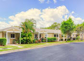 Thumbnail 7 of 15 - single story villa homes with lush tropical landscaping