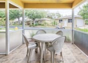 Thumbnail 13 of 15 - Outdoor patio with table and chairs