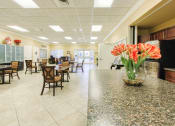 Thumbnail 10 of 15 - Kitchen Island in community room with tulips
