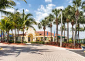 Thumbnail 8 of 24 - lush landscaping beautifies Crystal Lake Apartments in Hollywood, FL