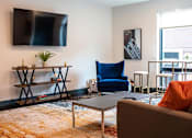 Thumbnail 66 of 82 - Living_Room_with_TV at Holmes Beverly, Beverly, MA
