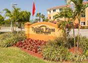 Thumbnail 7 of 13 - welcome signage at Tallman Pines Apartments