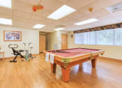 Thumbnail 11 of 23 - pool table and exercise bikes 