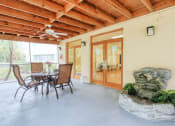 Thumbnail 17 of 23 - Covered Patio with table, chairs, and ceiling fan