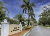 Thumbnail 1 of 23 - Monument sign at entrance of Villa Madonna Senior Apartments
