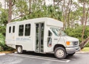 Thumbnail 23 of 23 - Transport Shuttle parked in lot at Villa Madonna