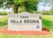 Thumbnail 1 of 16 - Monument sign in front of Villa Regina Senior Apartments