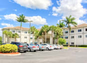 Thumbnail 3 of 16 - parking lot in front of Villa Regina Senior Apartments