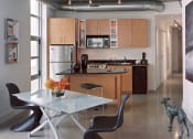 Thumbnail 2 of 8 - Living Room Come Kitchen View at The DeSoto Apartments, Washington, DC 20005