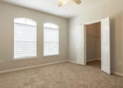 Thumbnail 30 of 33 - bedroom with walk-in closet