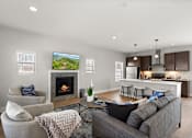 Thumbnail 1 of 54 - Living room at the Quarry Apartments in DeWitt Michigan