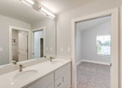 Thumbnail 20 of 54 - Bathroom at the Quarry Apartments in DeWitt Michigan