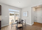 Thumbnail 3 of 54 - Dining room at the Quarry Apartments in DeWitt Michigan