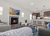 Thumbnail 4 of 54 - Living room at the Quarry Apartments in DeWitt Michigan