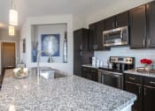 Thumbnail 9 of 40 - Kitchen at Watermark on Twenty Mile, Parker