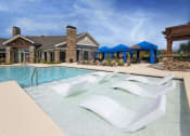Thumbnail 34 of 62 - Poolside Sundeck With Relaxing Chairs at Watermark at Harvest Junction, Longmont, 80501