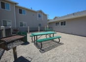 Thumbnail 6 of 13 - Grills and Picnic area at VIZCAYA APARTMENTS, SANTA MARIA, CA 