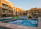 Thumbnail 1 of 75 - An outdoor pool at an apartment home complex at The Apex at CityPlace, Overland Park, KS
