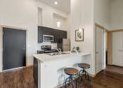 Thumbnail 11 of 14 - Kitchen with cabinets and counter at Bridgeview 125, University Place, WA