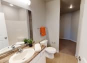 Thumbnail 19 of 92 - Bathroom With Storage Area at Upscale Living at the Grand off 45th, Fargo, North Dakota