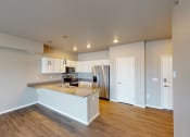 Thumbnail 84 of 92 - Kitchen With Modern Lighting at Upscale Living at the Grand off 45th, Fargo