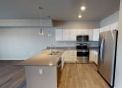 Thumbnail 83 of 92 - Renovated Kitchen at Upscale Living at the Grand off 45th, North Dakota
