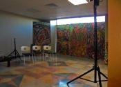 Thumbnail 10 of 18 - mural in room with studio lighting and chairs for seating
