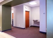Thumbnail 7 of 18 - bathrooms and water fountains in lobby area