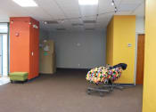 Thumbnail 6 of 18 - Seating area in Hoffman Hotel Apartments with artwork