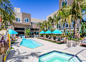 Thumbnail 19 of 53 - Outdoor lounge area, pool and hot tub at Vida North Park, San Diego, California