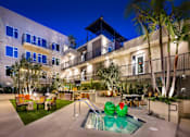 Thumbnail 29 of 53 - Outdoor lounge area and hot tub at Vida North Park, San Diego