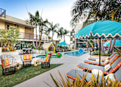 Thumbnail 9 of 53 - Outdoor lounge area and pool at Vida North Park, San Diego, CA