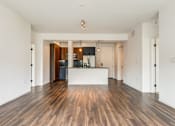 Thumbnail 43 of 53 - Kitchen and living room at Vida North Park, San Diego, California