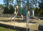 Thumbnail 17 of 18 - fenced play area with modern playground equipment