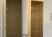 Thumbnail 13 of 18 - closet and linen closet with built-in wire shelving