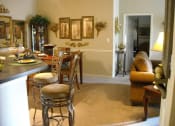 Thumbnail 8 of 13 - kitchen and living room area in open layout home