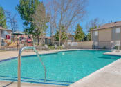 Thumbnail 12 of 22 - our apartments have a swimming pool with a fence around it