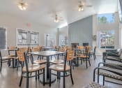 Thumbnail 16 of 22 - public dining area with tables and chairs and a fireplace