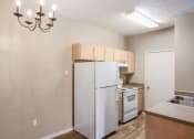 Thumbnail 8 of 15 - Model kitchen at Piedmont Park Apartments, Hattiesburg, MS